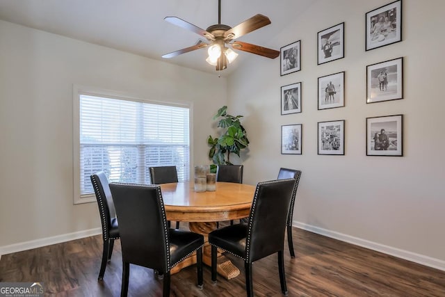 dining area with ceiling fan, baseboards, and dark wood-style flooring