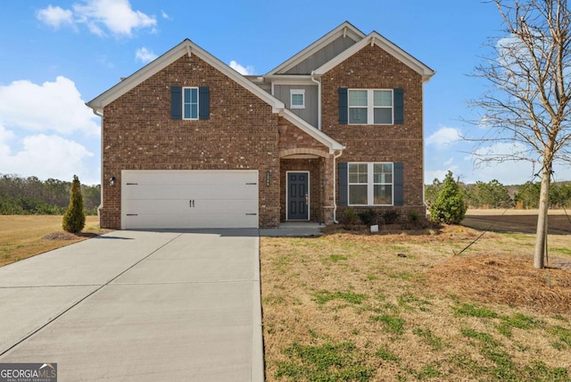 view of front of property with a garage, driveway, brick siding, and a front lawn