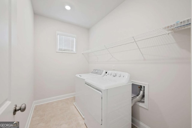 washroom featuring laundry area, baseboards, separate washer and dryer, and recessed lighting