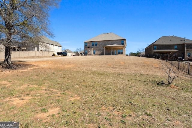 view of yard featuring fence