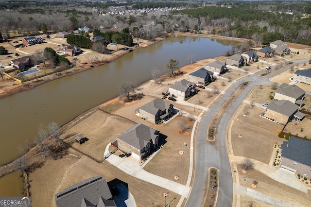 aerial view with a water view and a residential view