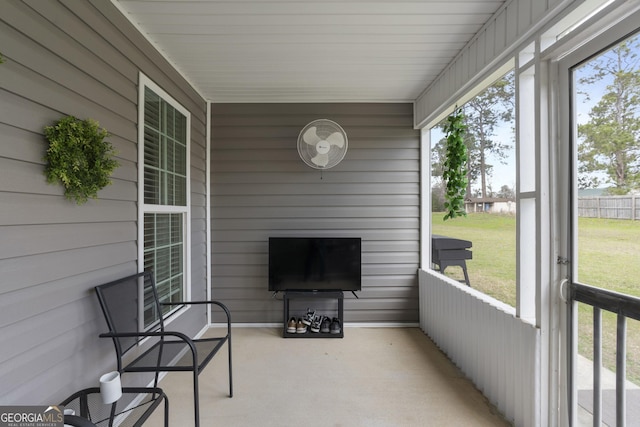 sunroom / solarium with a wealth of natural light