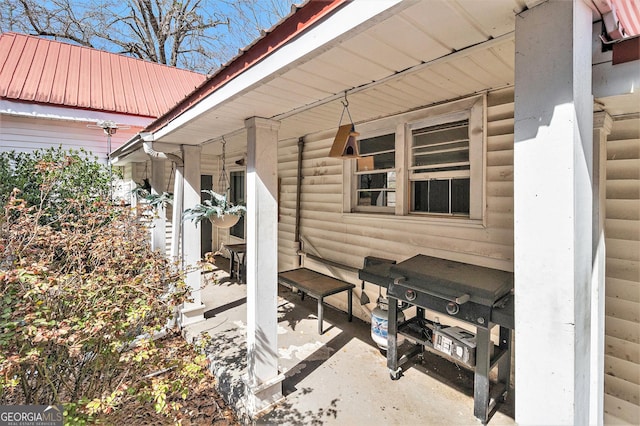 view of patio with a grill