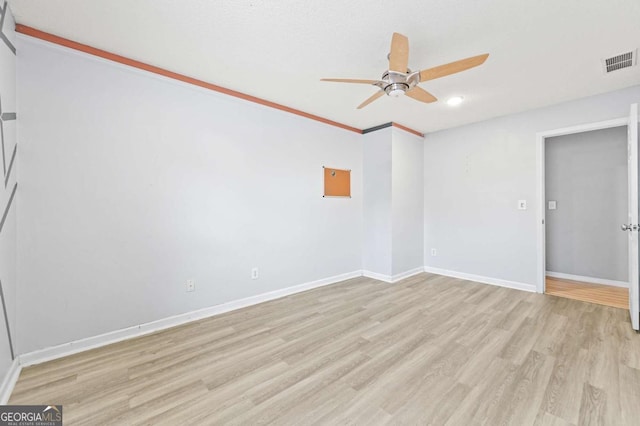 spare room with baseboards, visible vents, ceiling fan, light wood-style floors, and recessed lighting