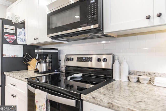 kitchen featuring white cabinetry and appliances with stainless steel finishes