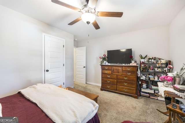 bedroom with carpet and a ceiling fan