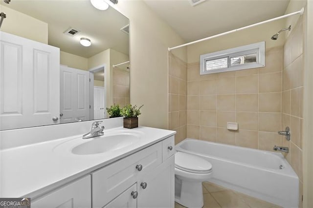 full bath with shower / tub combination, toilet, vanity, visible vents, and tile patterned floors