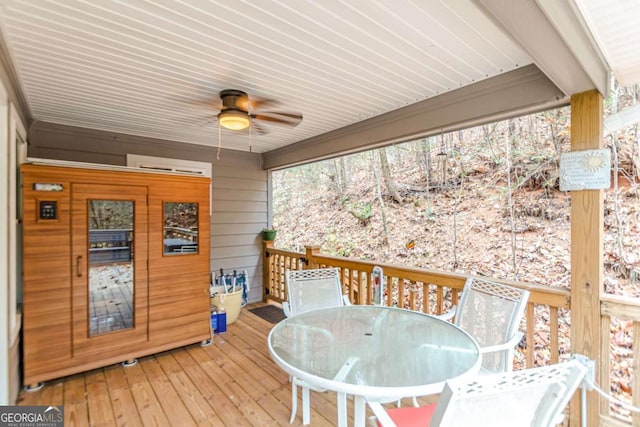 deck with a ceiling fan and outdoor dining area