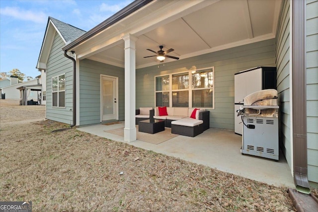 view of patio / terrace with ceiling fan and an outdoor living space