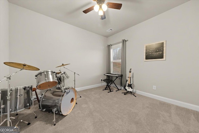 game room featuring visible vents, a ceiling fan, carpet flooring, vaulted ceiling, and baseboards