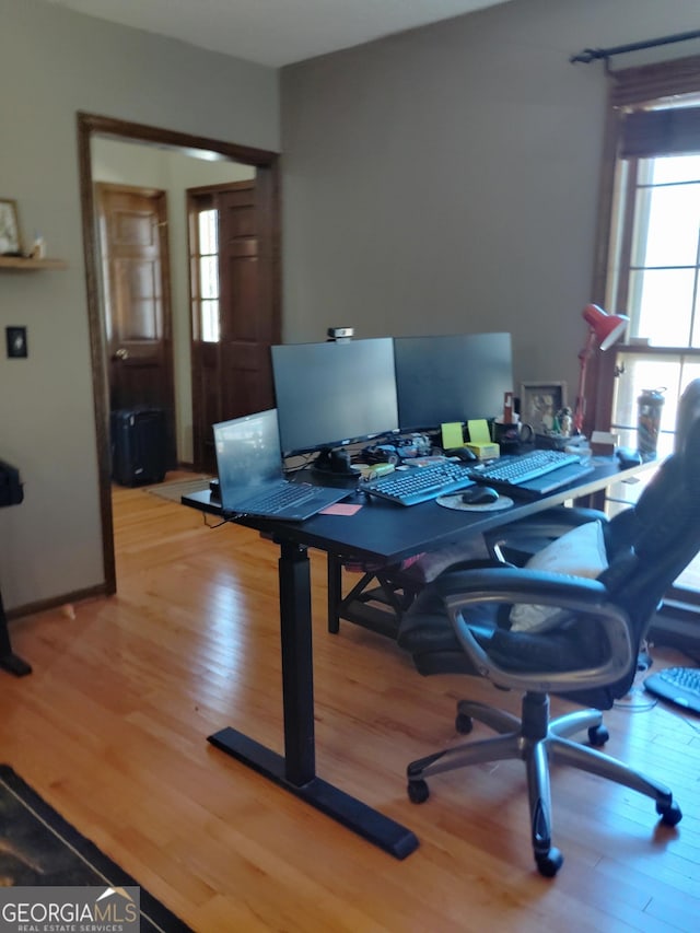 office space featuring wood finished floors