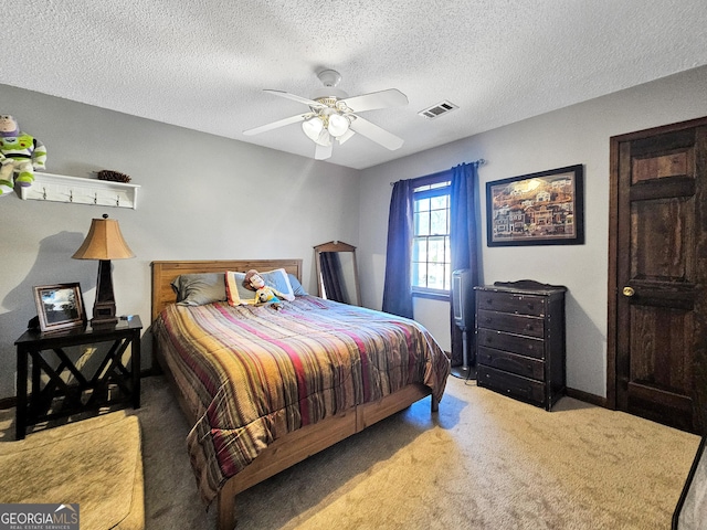 230 Mapledale Trl, Sharpsburg, GA 30277 - carpeted bedroom with a textured ceiling, ceiling fan, and baseboards