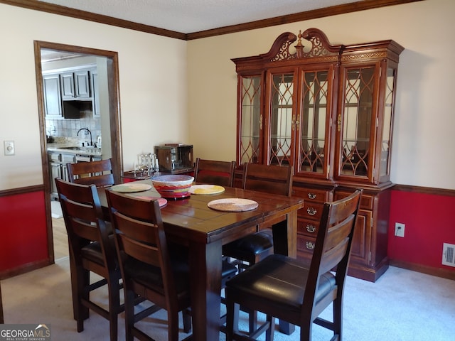 230 Mapledale Trl, Sharpsburg, GA 30277 - dining area with light carpet, crown molding, and baseboards