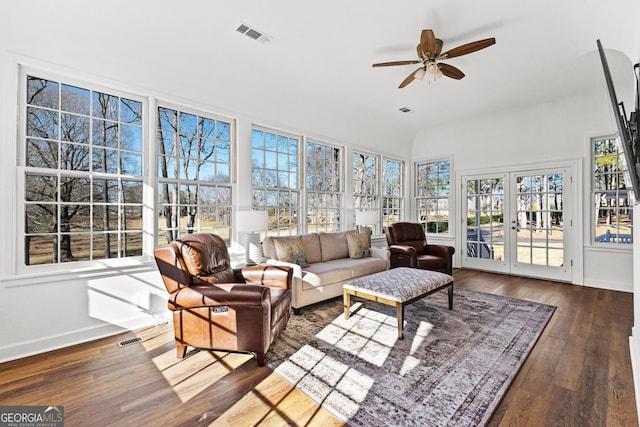 sunroom / solarium featuring french doors, visible vents, and ceiling fan