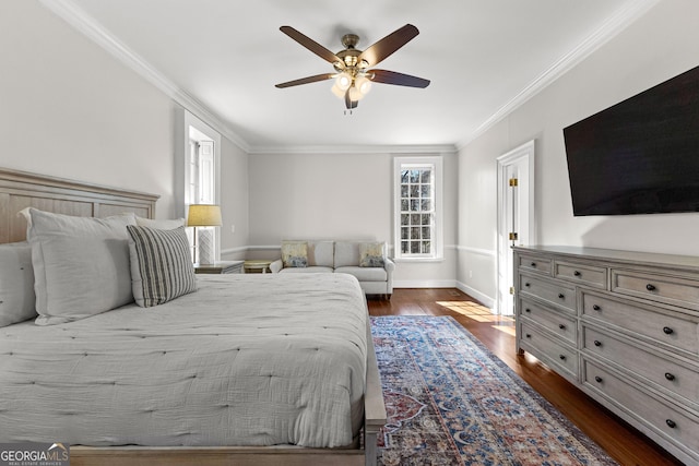 bedroom with baseboards, dark wood finished floors, a ceiling fan, and crown molding