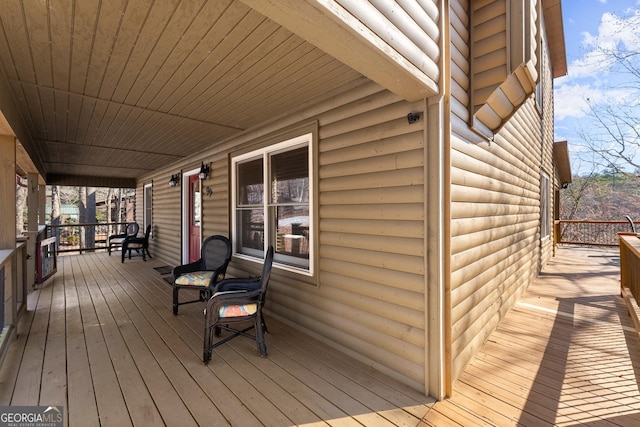 deck with covered porch