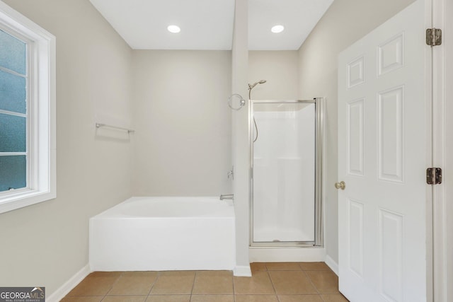 full bath featuring a stall shower, baseboards, a garden tub, tile patterned flooring, and recessed lighting