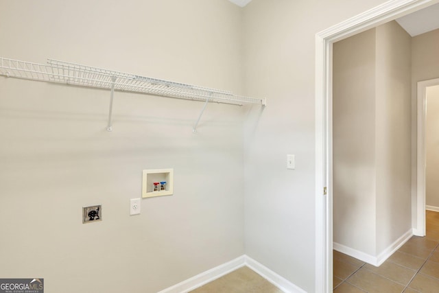 washroom with laundry area, washer hookup, baseboards, tile patterned floors, and electric dryer hookup