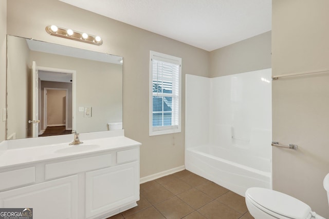 full bath with bathing tub / shower combination, vanity, toilet, and tile patterned floors