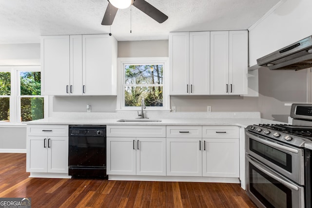 kitchen featuring range with two ovens, a sink, white cabinets, black dishwasher, and light countertops