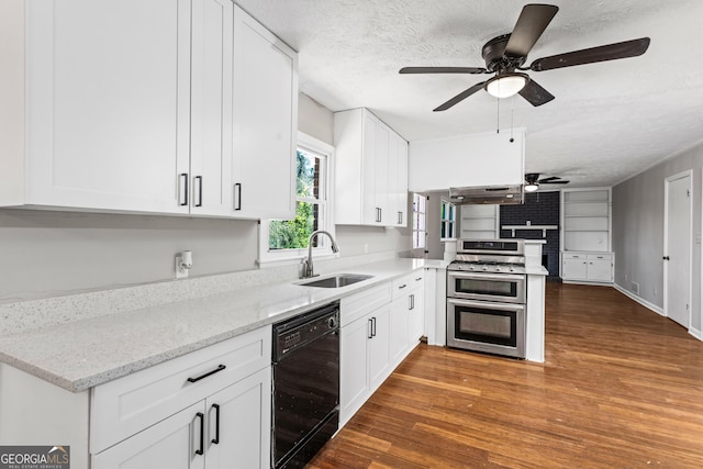 kitchen featuring double oven range, dishwasher, and white cabinetry