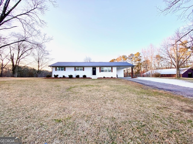 view of front of property with a front lawn