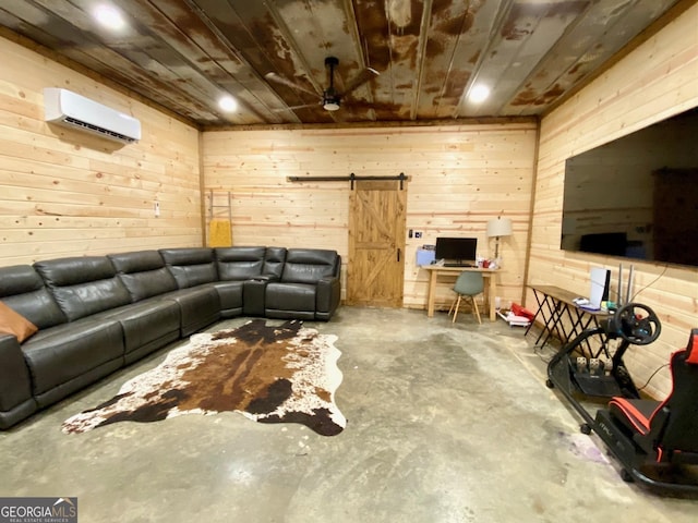 living area with a barn door, wood ceiling, unfinished concrete floors, an AC wall unit, and wood walls