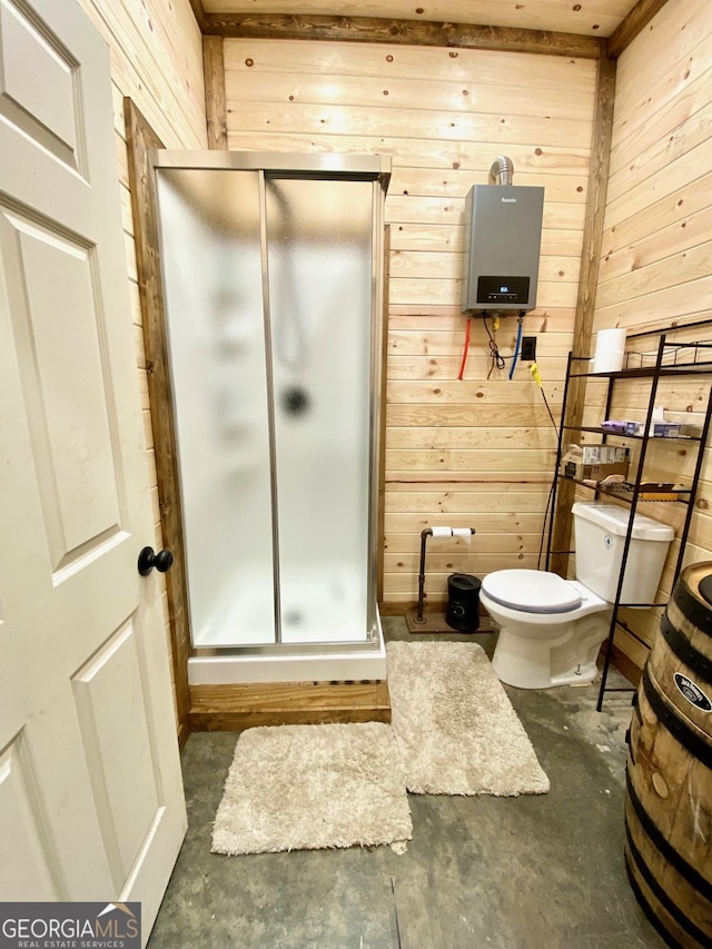 bathroom featuring wooden walls, toilet, and unfinished concrete floors