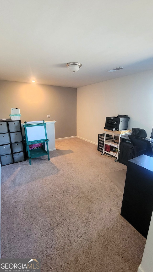 interior space featuring carpet, visible vents, and baseboards