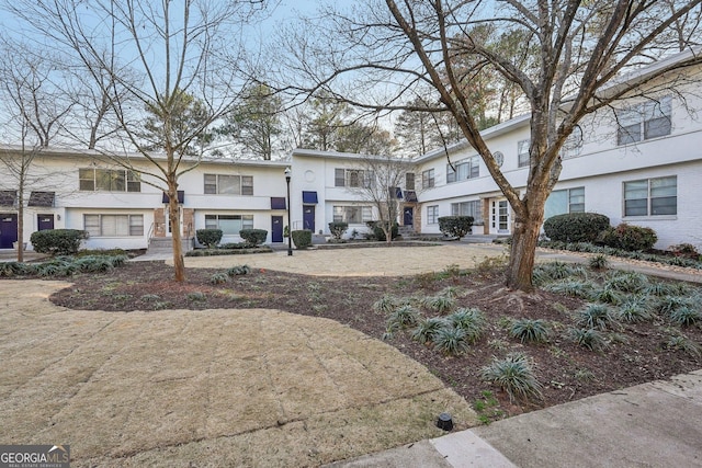 view of front of house featuring stucco siding