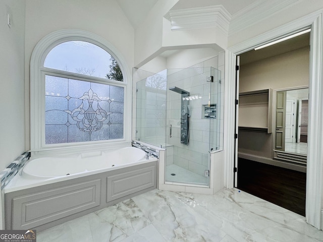 full bath with ornamental molding, marble finish floor, a garden tub, and a shower stall