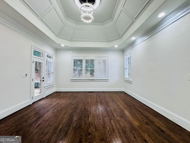 spare room with recessed lighting, dark wood-style flooring, coffered ceiling, baseboards, and ornamental molding