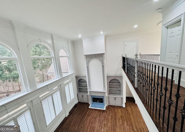 interior space with crown molding, dark wood-style flooring, and recessed lighting