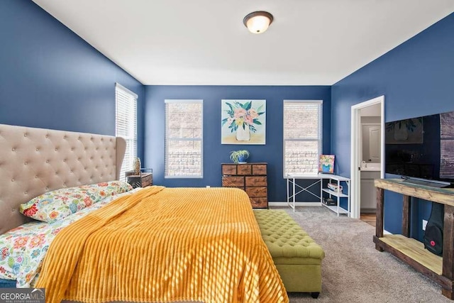 carpeted bedroom with baseboards