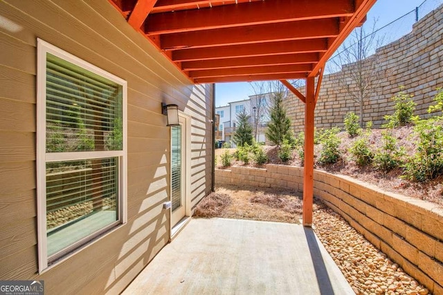 view of patio with fence