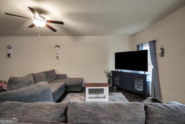 living room with dark wood finished floors and ceiling fan