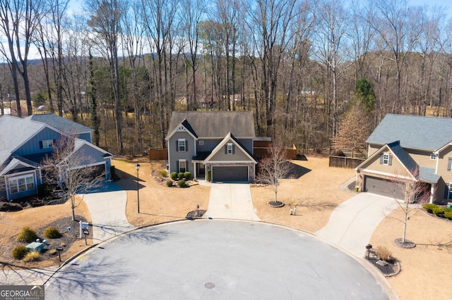 bird's eye view featuring a view of trees