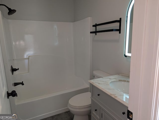 full bath featuring shower / bathtub combination, vanity, and toilet