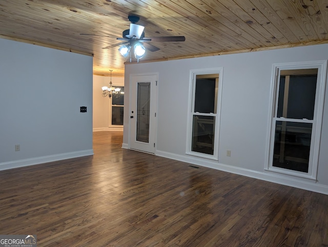 empty room with wood ceiling, baseboards, dark wood-style flooring, and ceiling fan with notable chandelier