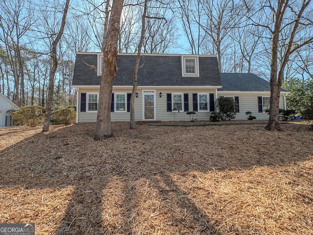 view of front of home with roof with shingles