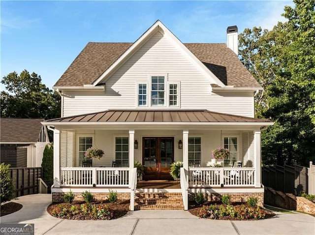 9370 Raldon Rd, Gainesville, GA 30506 - view of front of house featuring a porch, french doors, a standing seam roof, roof with shingles, and a chimney