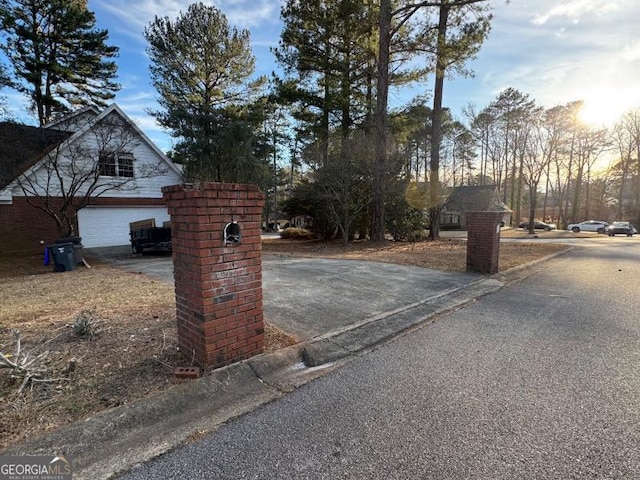 view of street featuring curbs