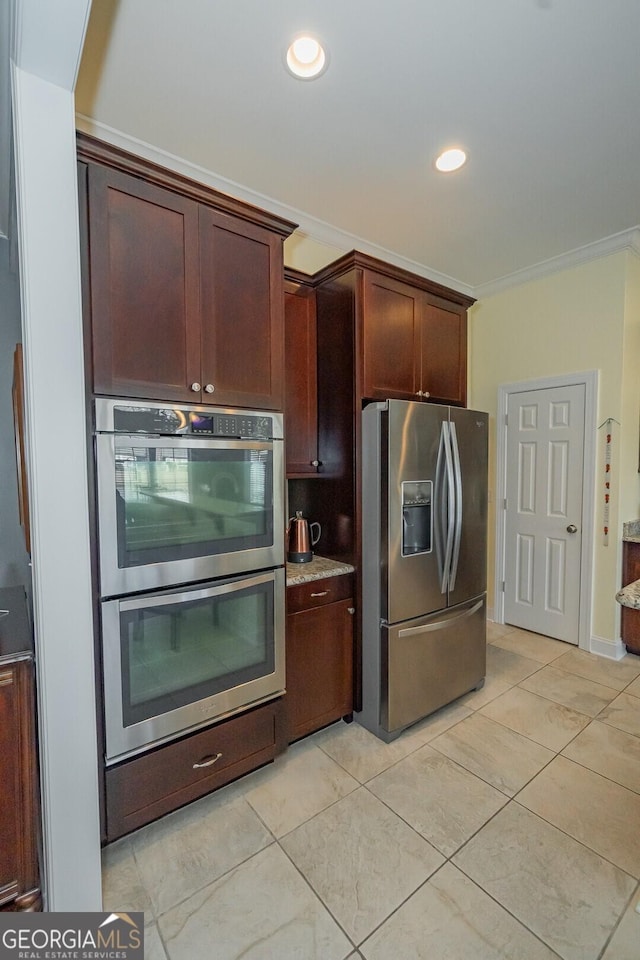 kitchen with stainless steel appliances, light stone counters, recessed lighting, and crown molding