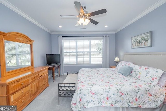 bedroom featuring a ceiling fan, light carpet, crown molding, and visible vents