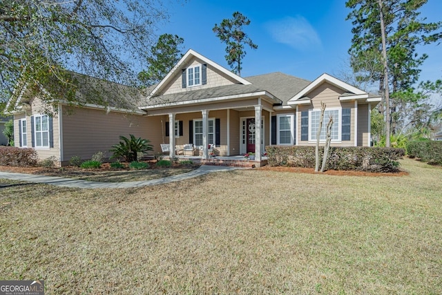 view of front of home featuring a porch and a front yard