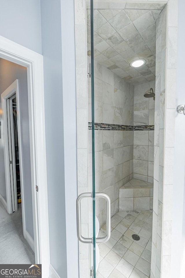 bathroom with a stall shower