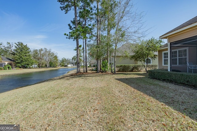 view of yard with a water view