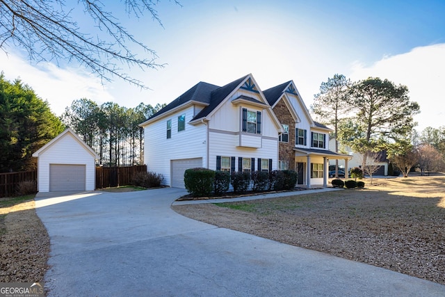 view of front facade featuring board and batten siding and fence