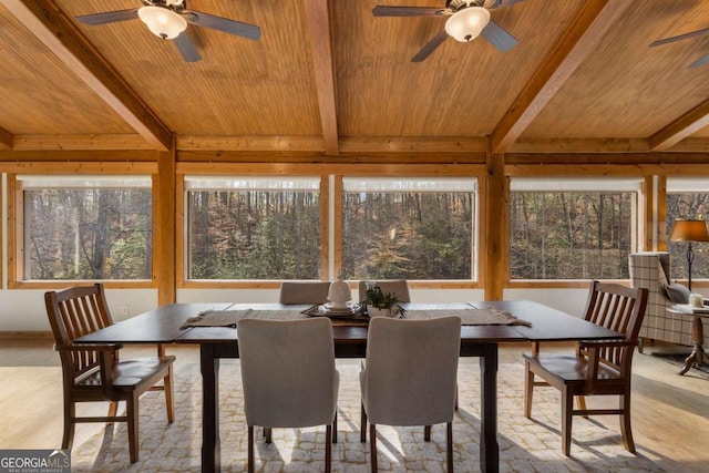 dining room featuring wood ceiling and beamed ceiling