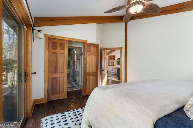 bedroom featuring lofted ceiling with beams, ceiling fan, dark wood finished floors, and baseboards